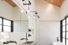 15 large skylights here keep the bathroom private and personal while filling it with light