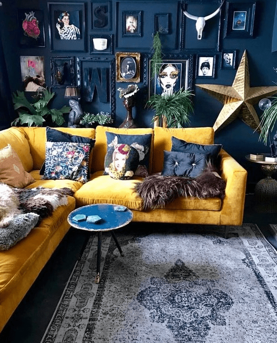 a moody living room with a yellow sofa