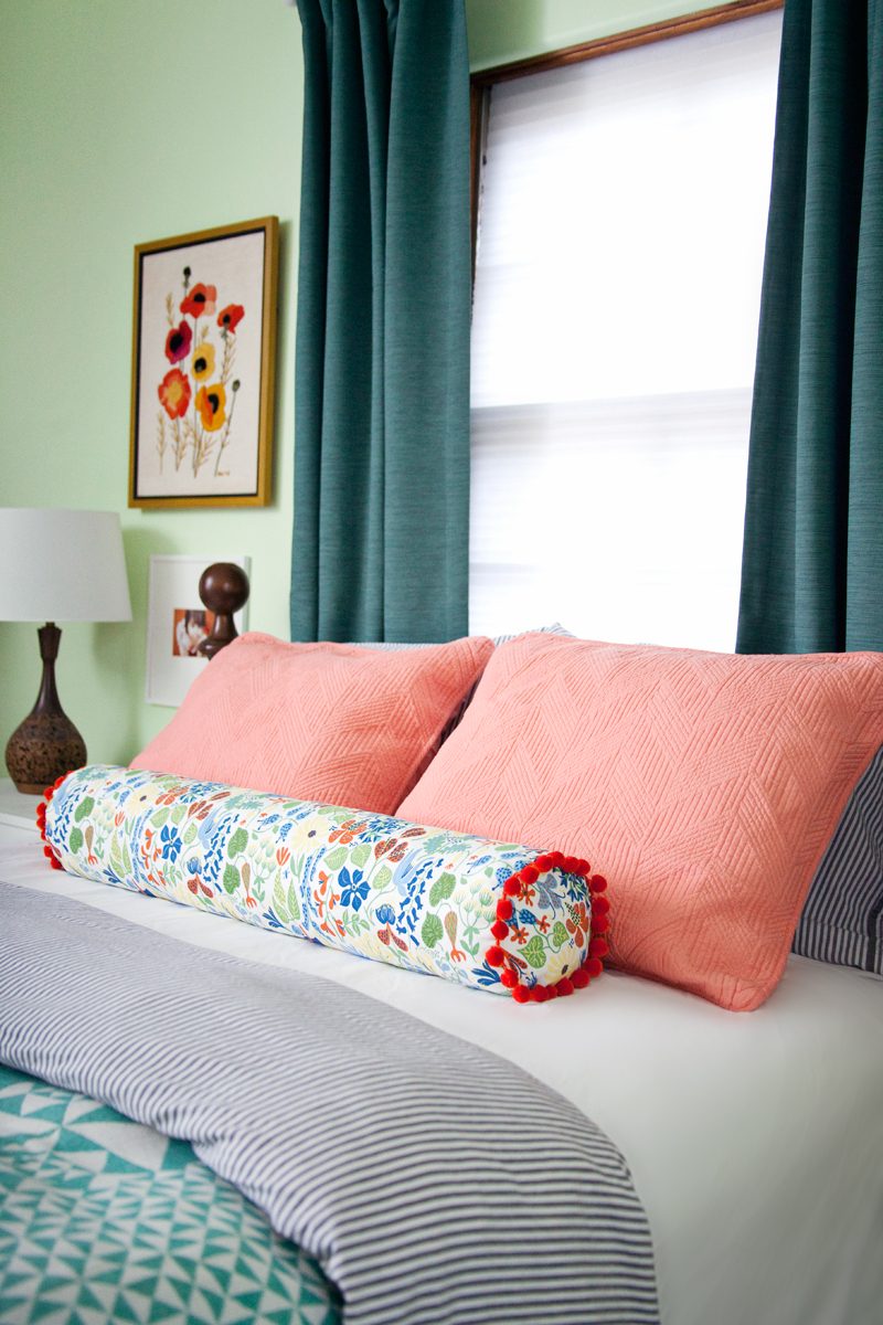 bright DIY bolster pillow for a summer bedroom