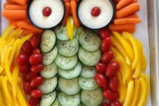 03 a fun veggie tray shaped as an owl and sauce bowls as eyes is a chic and fun idea