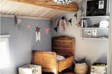 04 the rustic look is achieved with wooden beams and a wood kid’s bed, which echo with the wooden floor