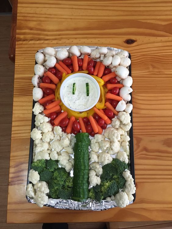 a sunflower veggie tray is a creative idea for any party