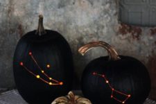 06 align the stars with these constellation pumpkins made with a drill, black paint, and a chisel