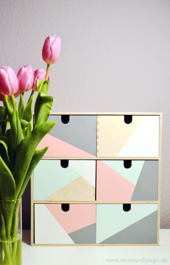 paint your own mini drawers to match the decor of your office, and house little things that are cluttering your desk