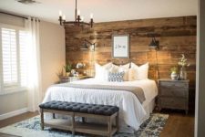 07 a reclaimed wood wall, wooden nightstands and a bench for a rustic bedroom