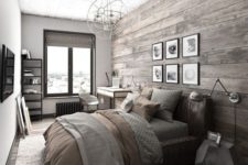 08 a reclaimed wood wall and floor, a leathe rupholstered bed give a cozy rustic feel