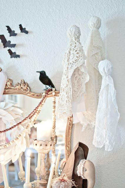 make some cool doily ghosts easily and hang them somewhere