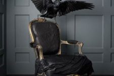 16 take a vintage chair, cover it with black cloth and gild the framing, attach a faux raven and voila, stylish decor is ready