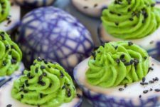 32 spider web deviled eggs look crazy and fun and will be loved by both adults and kids