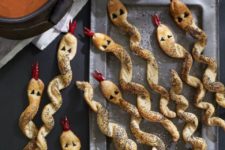 34 sweet pastry snakes with poppy seed will be funny for a kids party