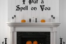 03 a fireplace pumpkin display – striped and painted pumpkins for Halloween