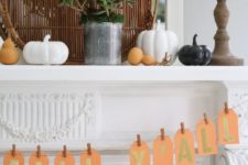 06 a modern mantel with porcelain pumpkins and pears, succulents and a bread basket for a cozy feel