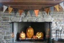 06 place some Jack-o-lanterns inside your fireplace to make it Halloween-like