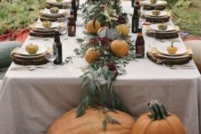07 a leafy table runner with real pumpkins for a cozy table setting