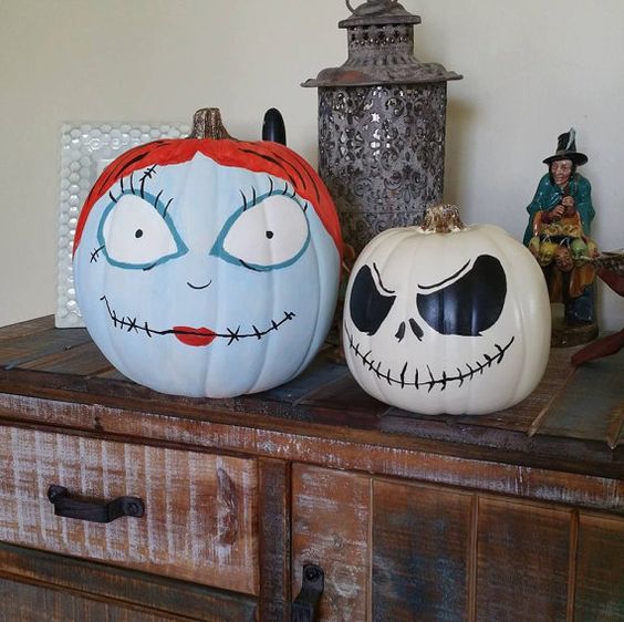 painted Jack Skellington and Sally pumpkins are a nice idea for a Halloween craft