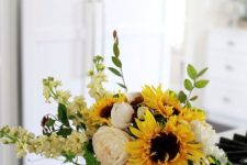 08 a bold arrangement with sunflowers, white blooms and greenery will add fall colors