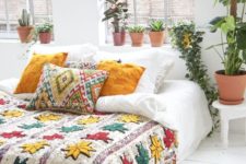 10 a colorful bedding set in red, yellow and emerald looks boho and fall-like