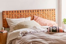 11 a boho-inspired space with a woven leather headboard looks cool