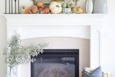 11 a fresh take on rustic decor with various natural pumpkins and a fall leaf wreath