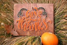12 a cool sign with ‘Give thanks’ and greenery touches