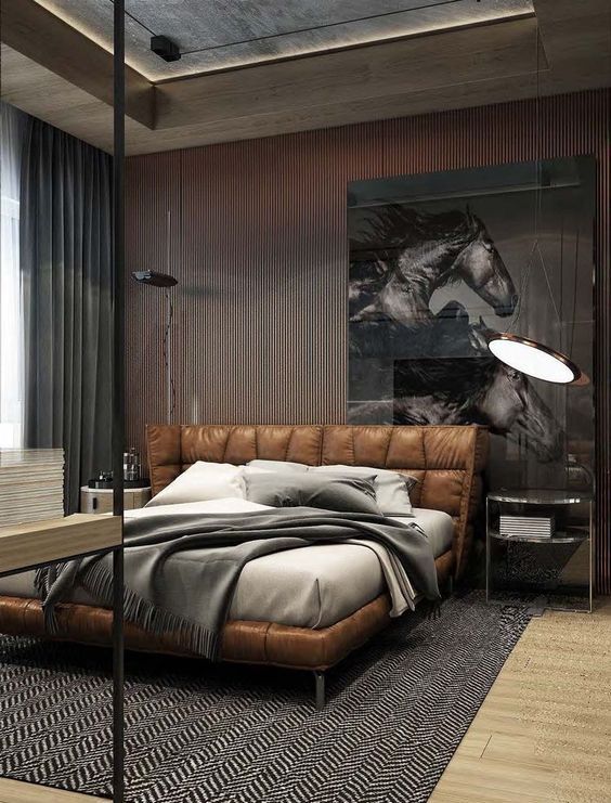a brown leather upholstered bed is ideal for any manly space