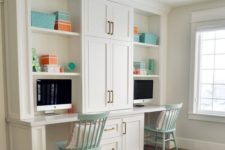 13 a vintage-inspired study space with white cabinetry and desks integrated into it