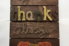 14 a rustic string art sign with pumpkins and words ‘Give Thanks Always’