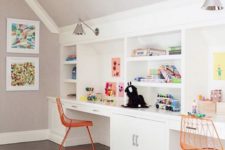 14 a whole wall is taken with white cabinetry and shelves and desks integrated for studying
