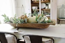 16 a vintage bread bowl with neutral pumpkins and pale foliage is easy to recreate