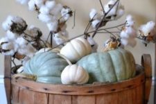 16 a wooden basket with white and green pumpkins and cotton branches for a neutral look