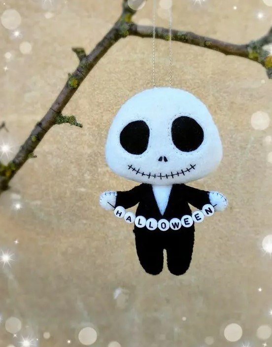 a Nightmare Before Christmas inspired Halloween ornament in black and white is a very fresh and cool solution for decor