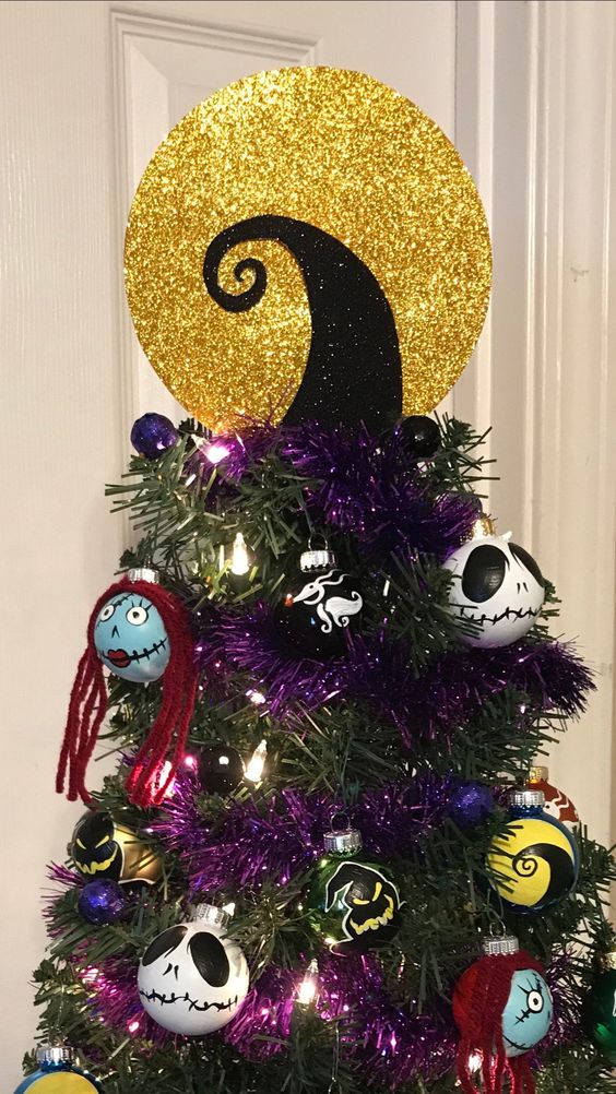 a bold Nightmare Before Christmas tree with themed ornaments, lights and a creative and bold topper is amazing