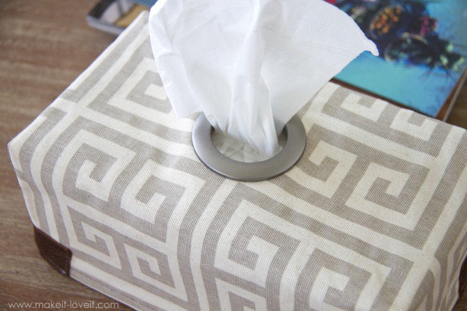 DIY fabric tissue box cover with a grommet (via www.makeit-loveit.com)
