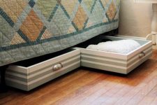 DIY rolling underbed drawers covered with wallpaper