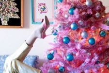 02 a pink Christmas tree with silver and blue ornaments for a fun touch