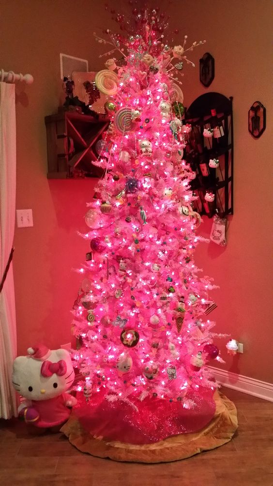 Hello Kitty Christmas tree in bold pink, with lights and fun ornaments