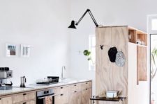 03 plywood cabinets make the kitchen look rustic yet modern and fresh