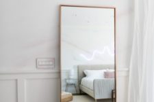 04 a modern mirror in a copper frame is always a fit for a modern bedroom