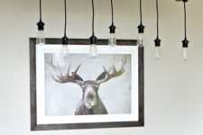 an industrial lamp with antlers