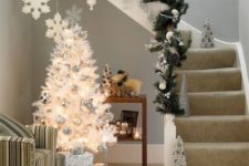05 shiny silver and champagne ornaments are a great idea to highlight the tree look