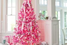 07 a bold pink Christmas tree with silverm white and metallic ornaments