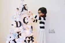 08 a white tree decorated with black letters will help your kid to learn them faster