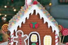 09 a crochet gingerbread house and man is a unique decoration for Christmas