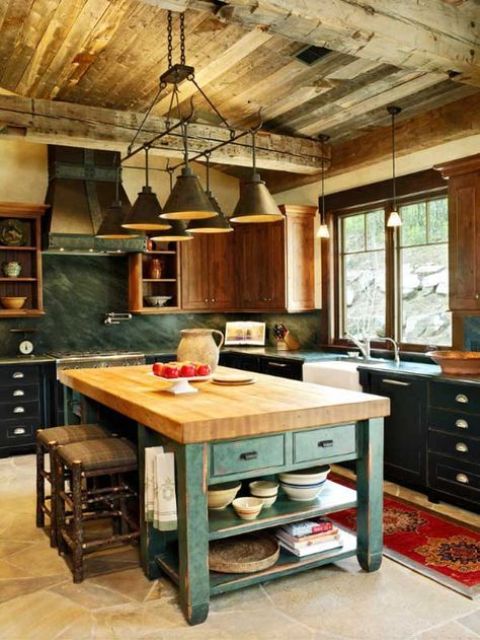 a rustic vintage kitchen island with a butcher's block countertop and soem storage shelves
