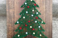 10 a Christmas tree string art decorated with red and white pompoms is great for winter
