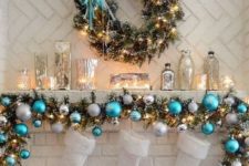 10 a garland with silver, striped and turquoise ornaments for decorating a mantel