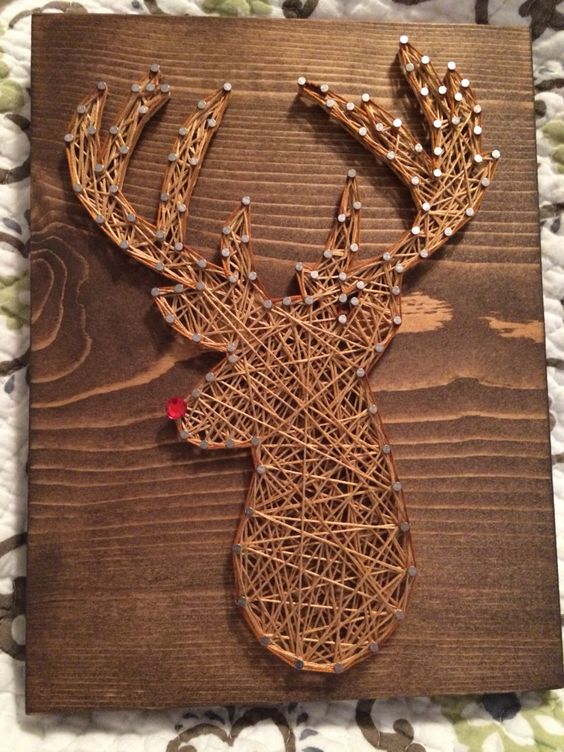 Rudolph the deer string art with a rhinestone red nose for Christmas