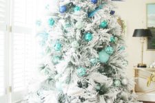 11 a flocked tree with ombre styling from electric blue to silver grey