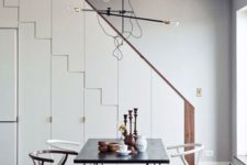 11 a simple industrial chandelier with long parts and bulbs for a modern space