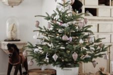 13 a Christmas tree with vintage white and copper ornaments and paper garlands